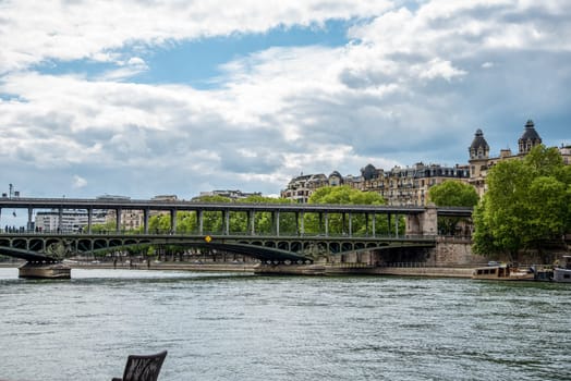 A metro crossing the bridge Bir Hakeim over the Seine in Paris, France