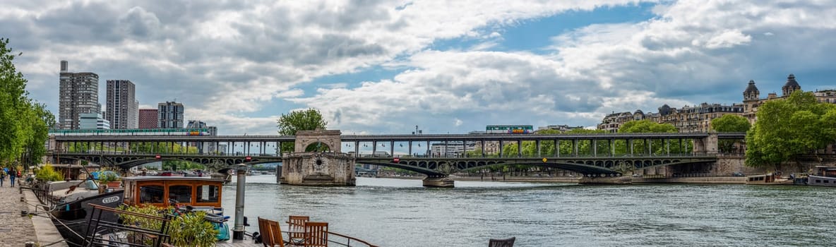 A metro crossing the bridge Bir Hakeim over the Seine in Paris, France