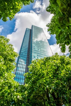 Modern Installation of a path in the trees between skyscrapers in La Defense financial district in Paris, France