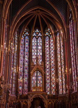 The inside of the famous Sainte Chapelle in Paris with impressing colorful windows, France