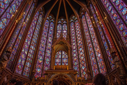 The inside of the famous Sainte Chapelle in Paris with impressing colorful windows, France