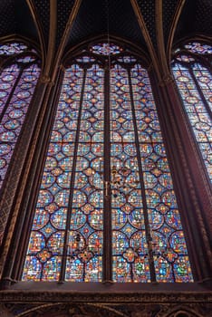 The inside of the famous Sainte Chapelle in Paris with impressing colorful windows, France