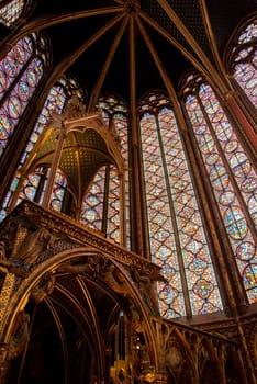 The inside of the famous Sainte Chapelle in Paris with impressing colorful windows, France