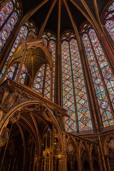 The inside of the famous Sainte Chapelle in Paris with impressing colorful windows, France