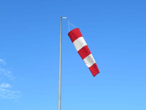 red and white wind indicator safety signal warning