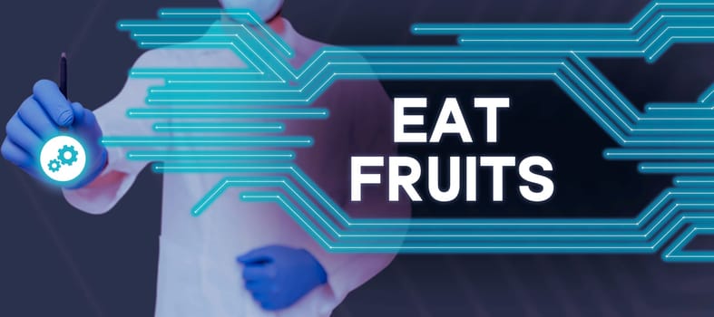 Hand writing sign Eat Fruits, Business overview consume any product of plant growth useful to humans or animals