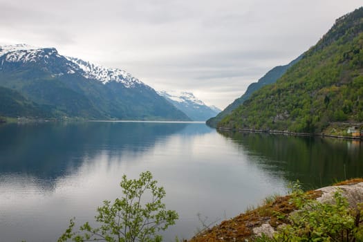 scenic landscapes of the northern Norwegian fjords in  spring .