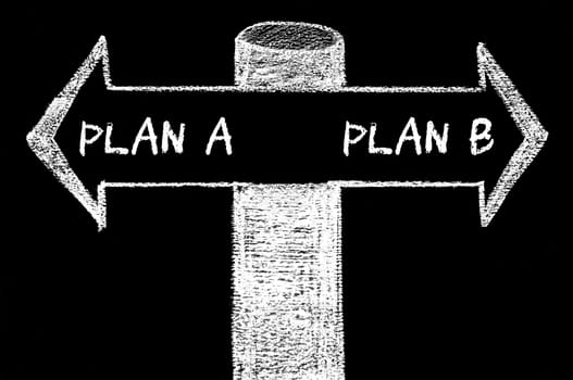 Opposite arrows with Plan A versus Plan B. Hand drawing with chalk on blackboard. Choice conceptual image