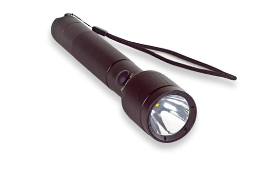 Black flashlight exposed on white background
