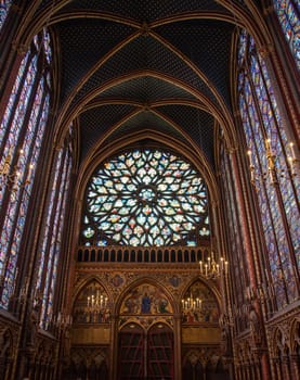 The inside of the famous Sainte Chapelle in Paris with impressing colorful windows, France