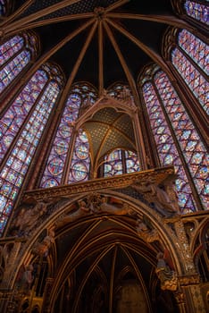 The inside of the famous Sainte Chapelle in Paris with impressing colorful windows, France