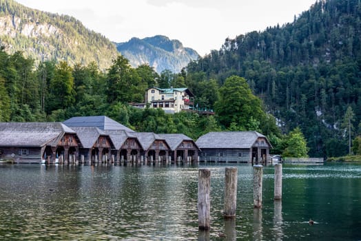Wooden Boathouses in Lake Koenigssee in Schoenau, Bavaria, Germany