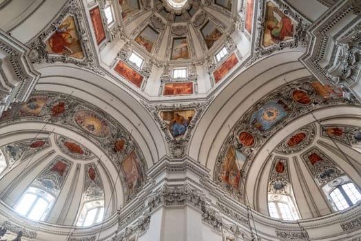 Famous frescos and stuccos at the ceiling of the Salzburg cathedral, Austria