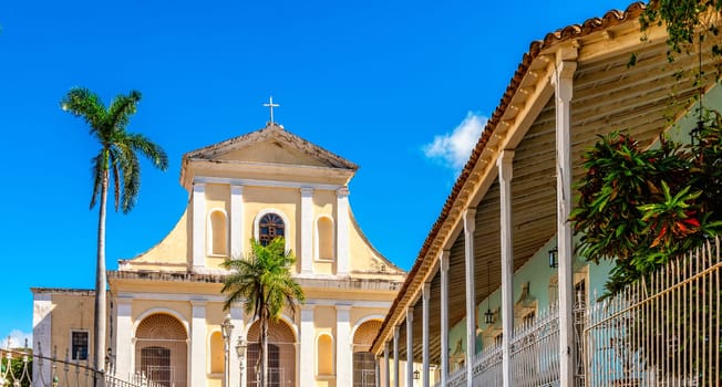 Trinidad central square with palms and Church of the Holy Trinity cathedral, Trinidad, Cuba