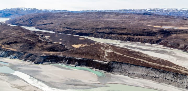Greenlandic tundra landscape with  river from ice cap melting, aerial view, near Kangerlussuaq, Greenland