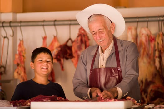The Butcher and his grandson of El Tuito, Mexico.