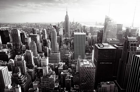 New York City skyline with urban skyscrapers at sunset, USA.
