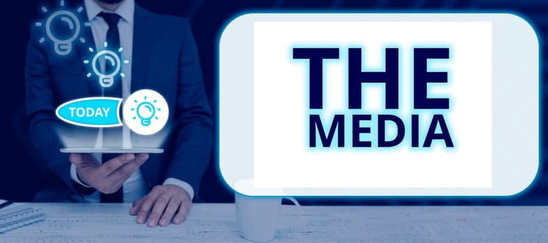 Writing displaying text The Media, Word for main means of mass communication that are regarded collectively