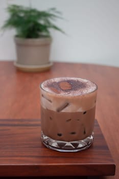 Iced coffee with micro foam in coffee shop, stock photo