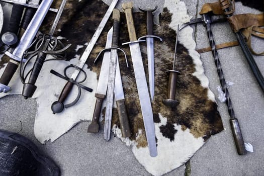 Detail of ancient medieval weapons, war and crime
