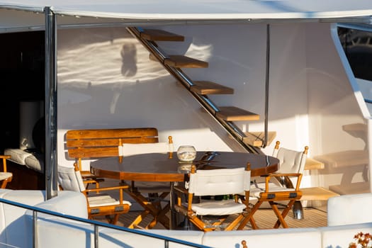 Luxury yacht. Comfortable expensive wooden design and furniture for holiday recreation tourism or travel and wealth concept