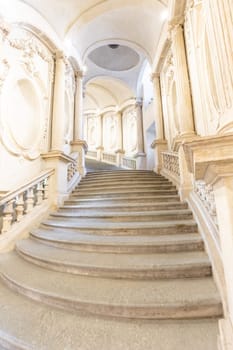 Turin, Italy - Circa January 2022: luxury marble staircase. Antique architecture interior design