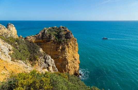 Ponta da Piedade cliffs near Lagos, Portugal. Beautiful seascape with natural rock formations in the Algarve, Portugal