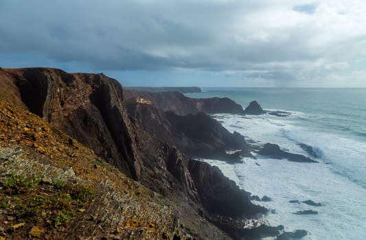 Cliffs in the Algarve West Coast, near Arrifana, Portugal