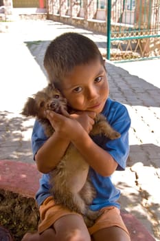 A boy and his dog in El Tuito, Mexico.