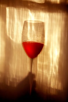 A raised Wine glass.