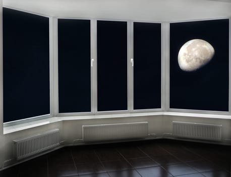 View of moon through window. Sky panorama. View of moon in blue sky. Panorama with moon and sky from window of room. Lunar landscape from bedroom window. Celestial landscape. Room window