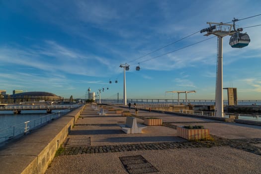 Lisbon, Portugal - October 10, 2022: Vasco da Gama Tower, the Myriad Hotel and the Vasco da Gama Bridge in the Park of Nations.