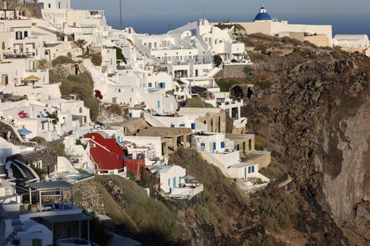 Imerovigli, Santorini, Greece - June 29, 2021:  Whitewashed houses in Imerovigli on Santorini island, Cyclades, Greece