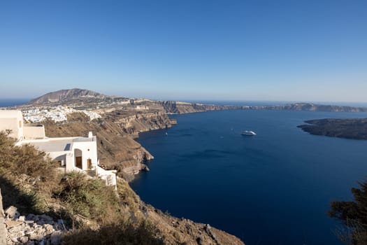 Panoramic view of the Santorini caldera cliffs from the Imerovigli village on Santorini island, Greece