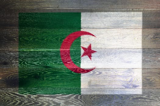An Algeria flag on rustic old wood surface background