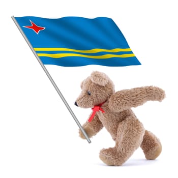 An Aruba flag being carried by a cute teddy bear