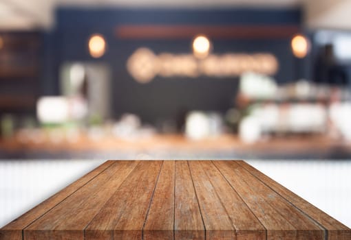 Perspective top wooden with blurred cafe background. product display template