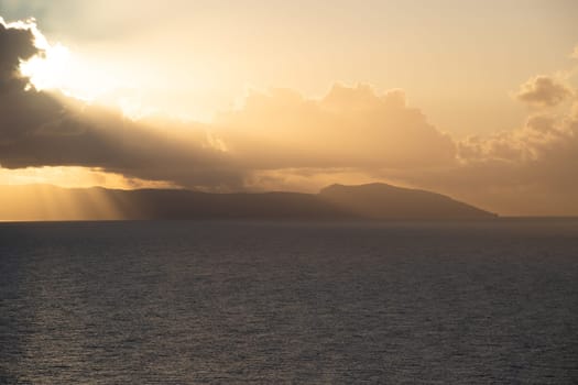View from Procida island - magic sunrise with dramatic clouds.