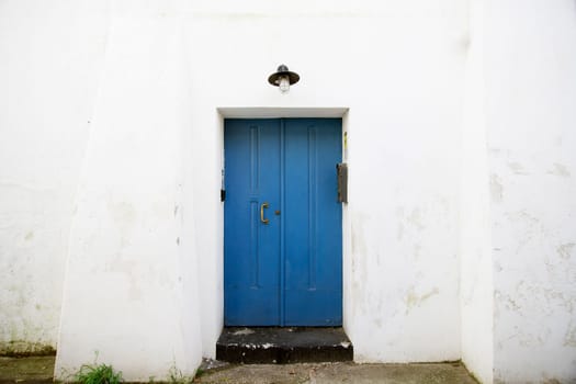 Procida island with colorful houses in small town street