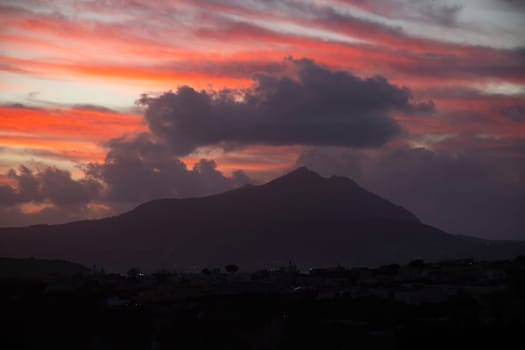 Magic sunset over Procida Island with Ischia island in the background.