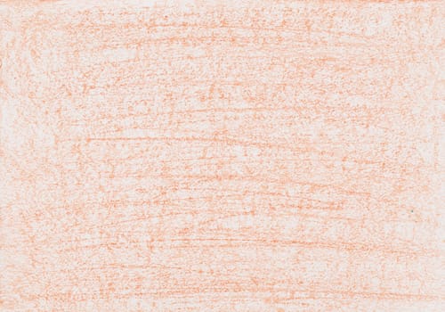 Texture from wax crayon paint in orange color on a white sheet of paper