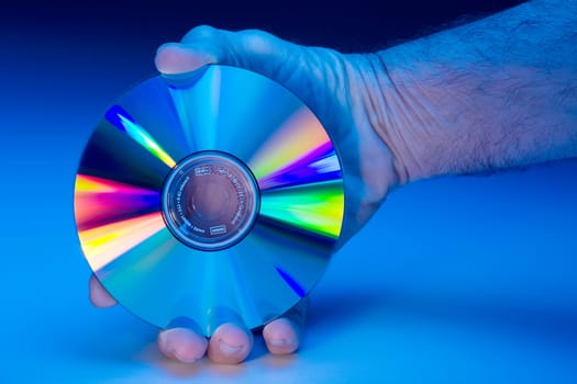 Compact Disks with rainbow colors.