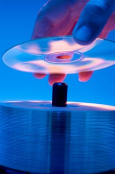 Compact Disks with rainbow colors.