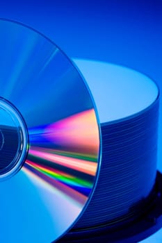 Compact Disks with rainbow colors.