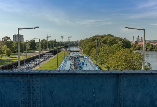 A cargo ship enters the Griesheim lock, Frankfurt, Germany
