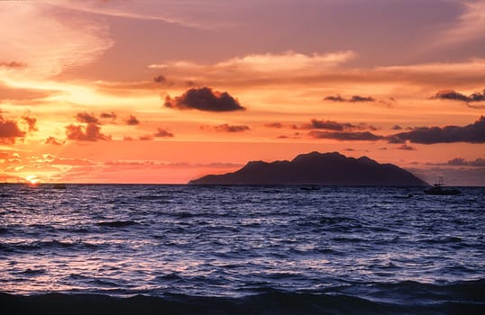 tropical beach at the sunset, baie beau vallon , Mahe island, Seichelles
