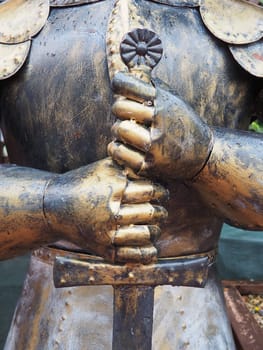 Ancient metal armor, iron detail. Armor, Safety weapon - in antiquity and the Middle Ages, a warriors safety weapon to protect different parts of the body, a piece of forged metal or a kit. Imitation