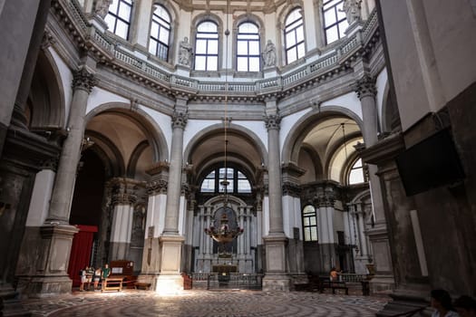Venice, Italy - Sept 5, 2022: Santa Maria Della Salute was built as a votive offering for the city's deliverance from the pestilence which had taken almost a third of the Venice's population in 1630