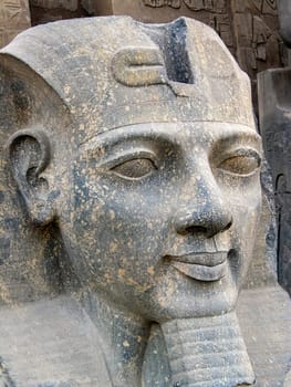 this is a statue of Ramses II At Luxor Temple Egypt.