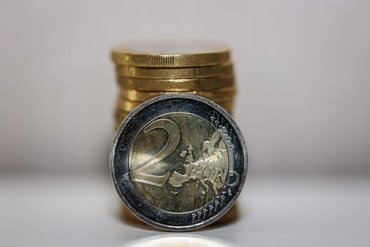 Two euro coins, close-up of a coin with the value of 2 euros.